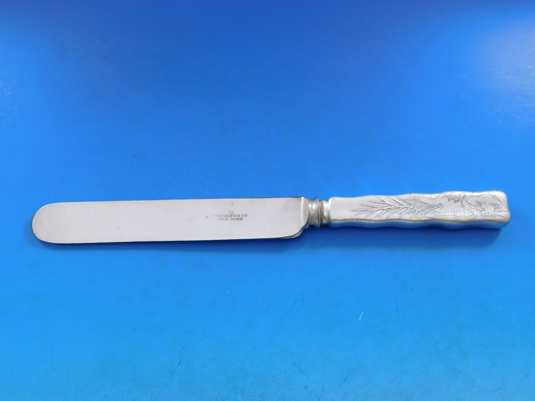 Tiffany & Co. Lap Over Edge Sterling Silver Knife 9 1/4" Mushroom Motif: Tiffany & Co. Lap Over Edge Sterling Silver Knife 9 1/4" Mushroom Motif This exquisite knife from Tiffany & Co. features a Lap Over Edge pattern, showcasing a beautiful acid-etched mushroom motif. Cra