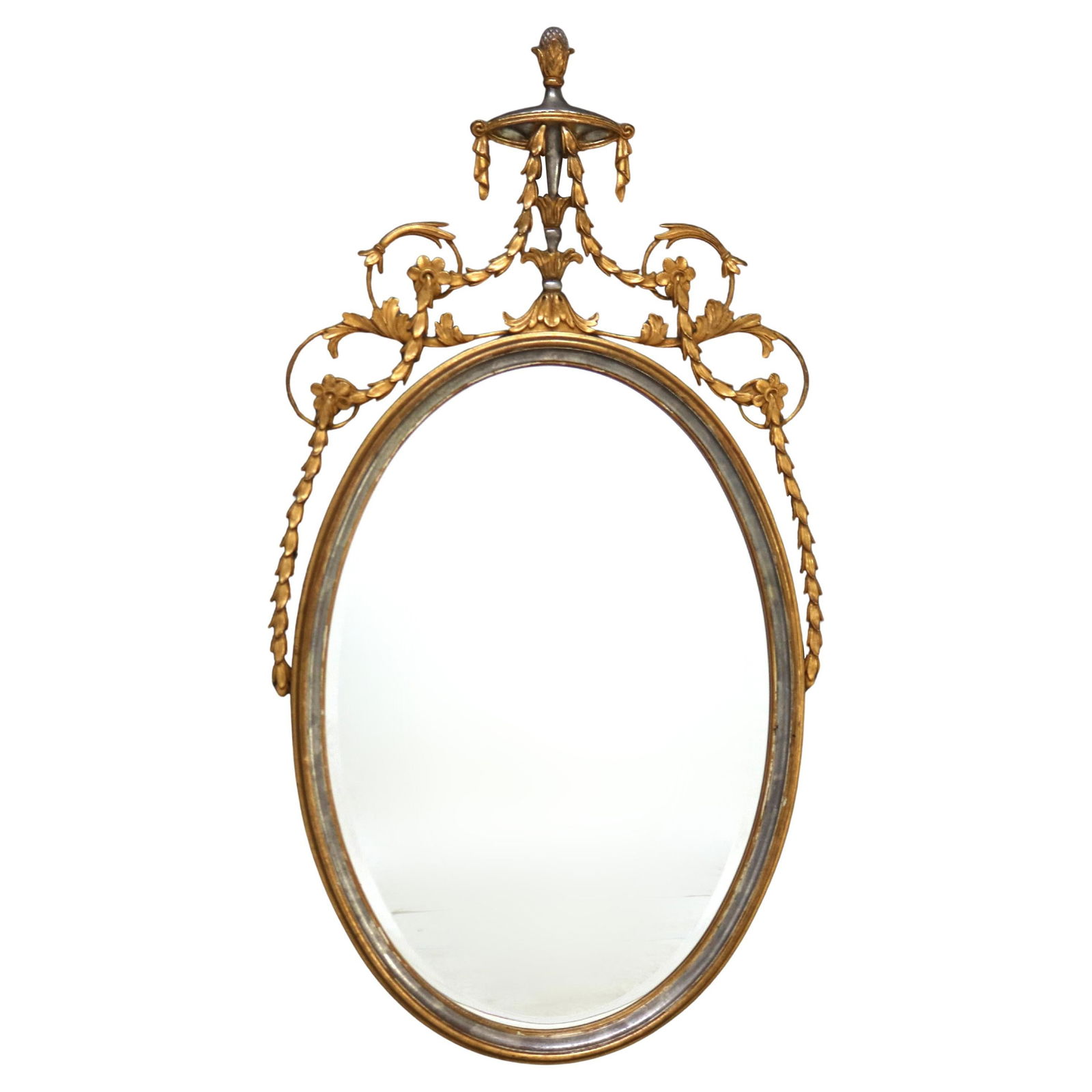 Antique French Giltwood Wall Mirror with Silver Accents and Urn Finial: Antique French Giltwood Wall Mirror with Silver Accents and Urn Finial This stunning Antique Oversized French Giltwood Wall Mirror features exquisite silver embellishments and a striking urn form fini