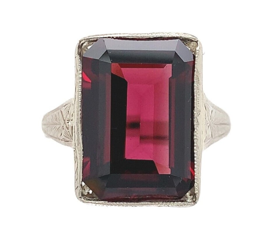 Vintage 14k Hand Engraved Ring with 8.35ct Rhodolite Garnet GIA Certified: Vintage 14k Hand Engraved Ring with 8.35ct Rhodolite Garnet GIA Certified Presenting a stunning vintage 14k white gold hand engraved ring, featuring a magnificent 8.35 carat genuine natural rhodolite
