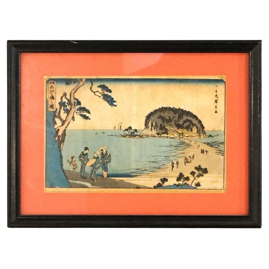 Framed Kunisada Japanese Seascape Woodblock Print with Figures Circa 1920: Framed Kunisada Japanese Seascape Woodblock Print with Figures Circa 1920 This antique Japanese woodblock print, attributed to Kunisada, depicts a tranquil seascape with figures walking along the