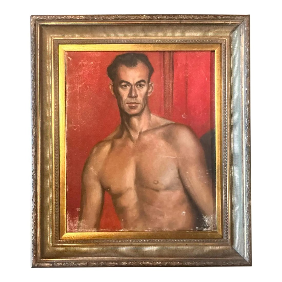 Framed Oil Painting Male Portrait on Red Background in Gilt Wood Frame: Framed Oil Painting Male Portrait on Red Background in Gilt Wood Frame This vintage original oil portrait depicts a shirtless man against a vivid crimson background. The artwork highlights skilled ana