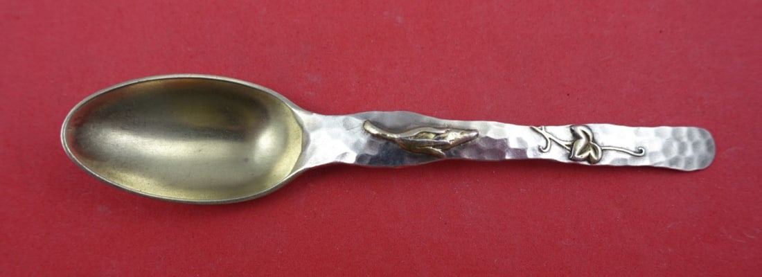 Tiffany & Co Lap Over Edge Sterling Coffee Spoon Gold Washed 4 7/8": Tiffany & Co Lap Over Edge Sterling Coffee Spoon Gold Washed 4 7/8" This exquisite coffee spoon from Tiffany & Co. features the elegant 'Lap Over Edge Mixed Metals' pattern, showcasing a stunning blen
