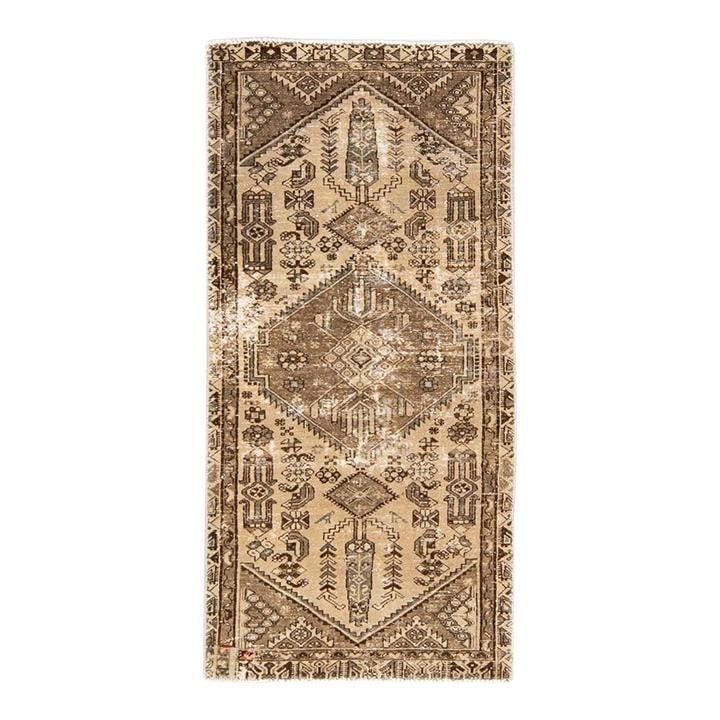 1960s Handmade Brown Wool Tribal Runner 3'2 x 6'7: 1960s Handmade Brown Wool Tribal Runner 3'2 x 6'7 This stunning vintage tribal runner showcases exquisite hand-knotting in rich brown wool. Adorned with vibrant blue, pink, and tan accents, it feature