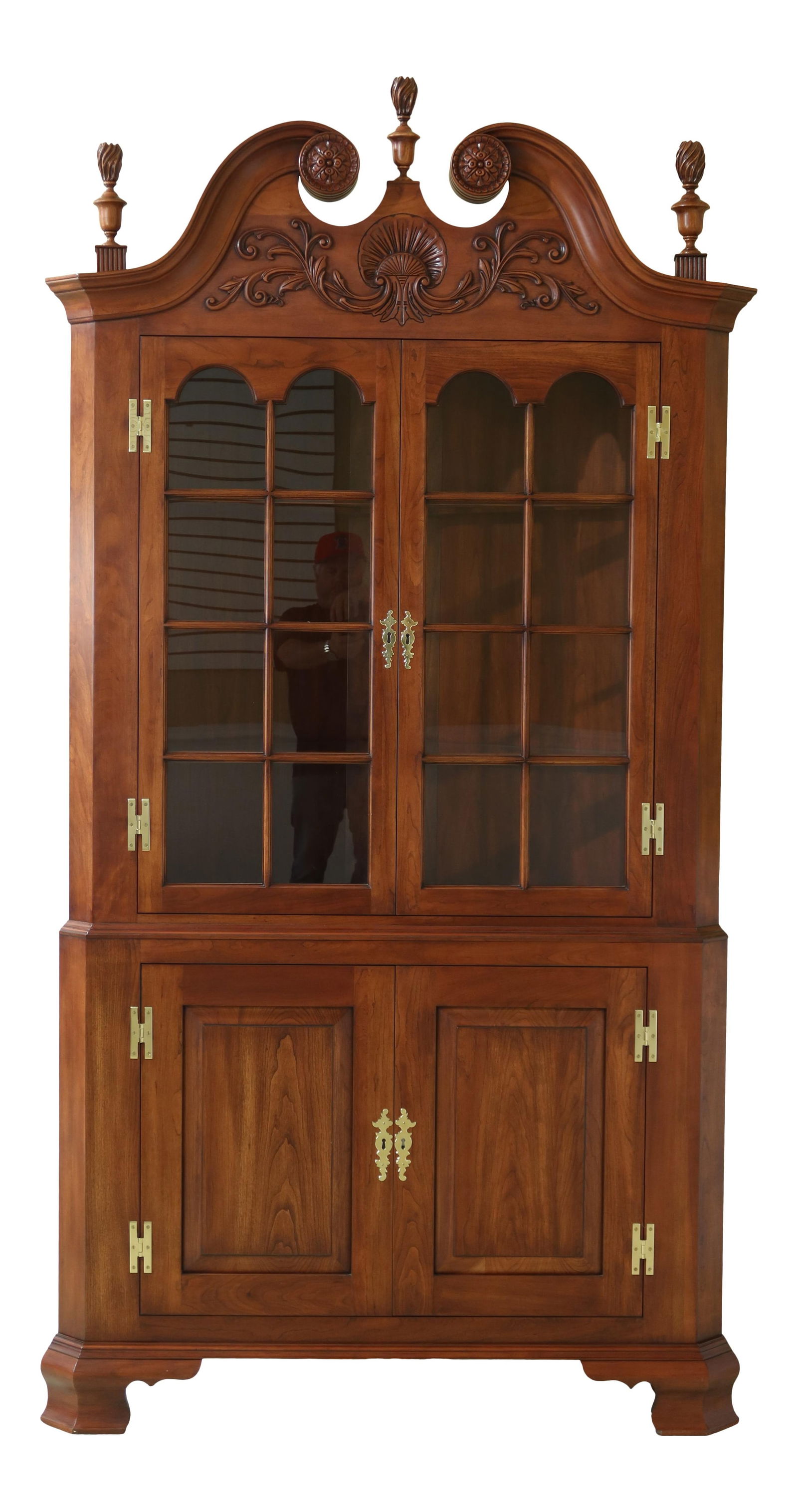 Henkel Harris Welford Corner China Cabinet Cherry Wood Chippendale Design Lighted Interior: Henkel Harris Welford Corner China Cabinet Cherry Wood Chippendale Design Lighted Interior This stunning Henkel Harris Cherry Welford Corner China Cabinet, crafted circa 1993, showcases a classic Chip