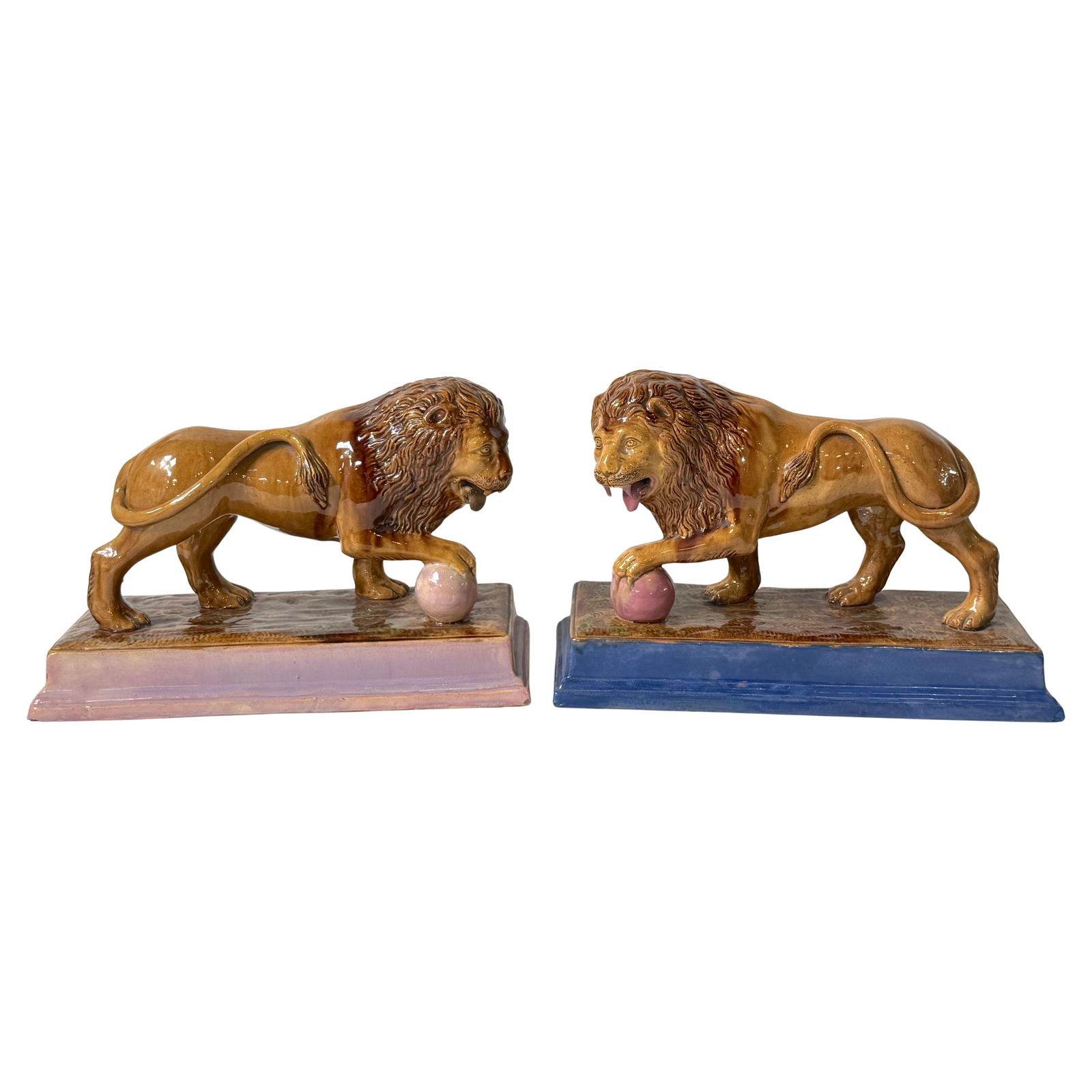 Rare Set of Ralph Wood Staffordshire Medici Lions Pink Blue Bases: Rare Set of Ralph Wood Staffordshire Medici Lions Pink Blue Bases This rare pair of Staffordshire Medici lions, attributed to Ralph Wood, showcases the unique artistry of early 19th-century English po