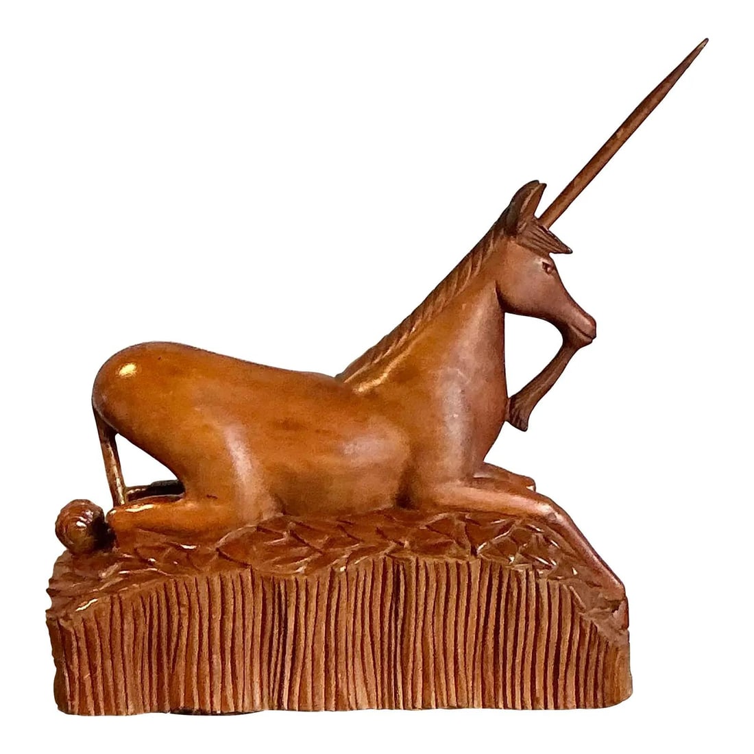 Hand Carved Wooden Reclining Unicorn Folk Art Sculpture 21" Tall: Hand Carved Wooden Reclining Unicorn Folk Art Sculpture 21" Tall This vintage unicorn sculpture is hand-carved from a single piece of wood, capturing mythical charm and folk art elegance. The unicorn