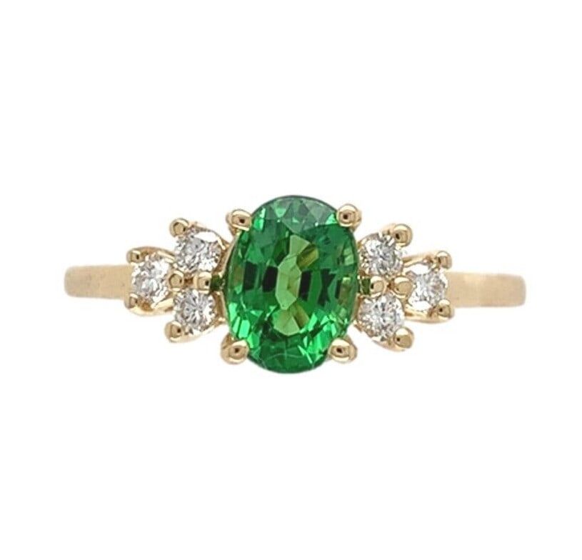 14k Yellow Gold 1.11ct Tsavorite Garnet Diamond Ring GIA Certified: 14k Yellow Gold 1.11ct Tsavorite Garnet Diamond Ring GIA Certified This stunning ring features a vibrant 1.11 ct Tsavorite garnet, showcasing a bright grass green color. The oval garnet, measuring app