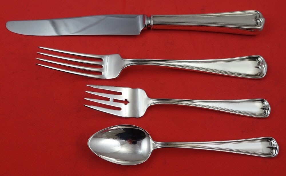 Dominick & Haff Lexington Sterling Silver 4-Piece Dinner Set: Dominick & Haff Lexington Sterling Silver 4-Piece Dinner Set This exquisite 4-piece dinner place setting by Dominick & Haff features the elegant Lexington pattern. Crafted from high-quality sterling s