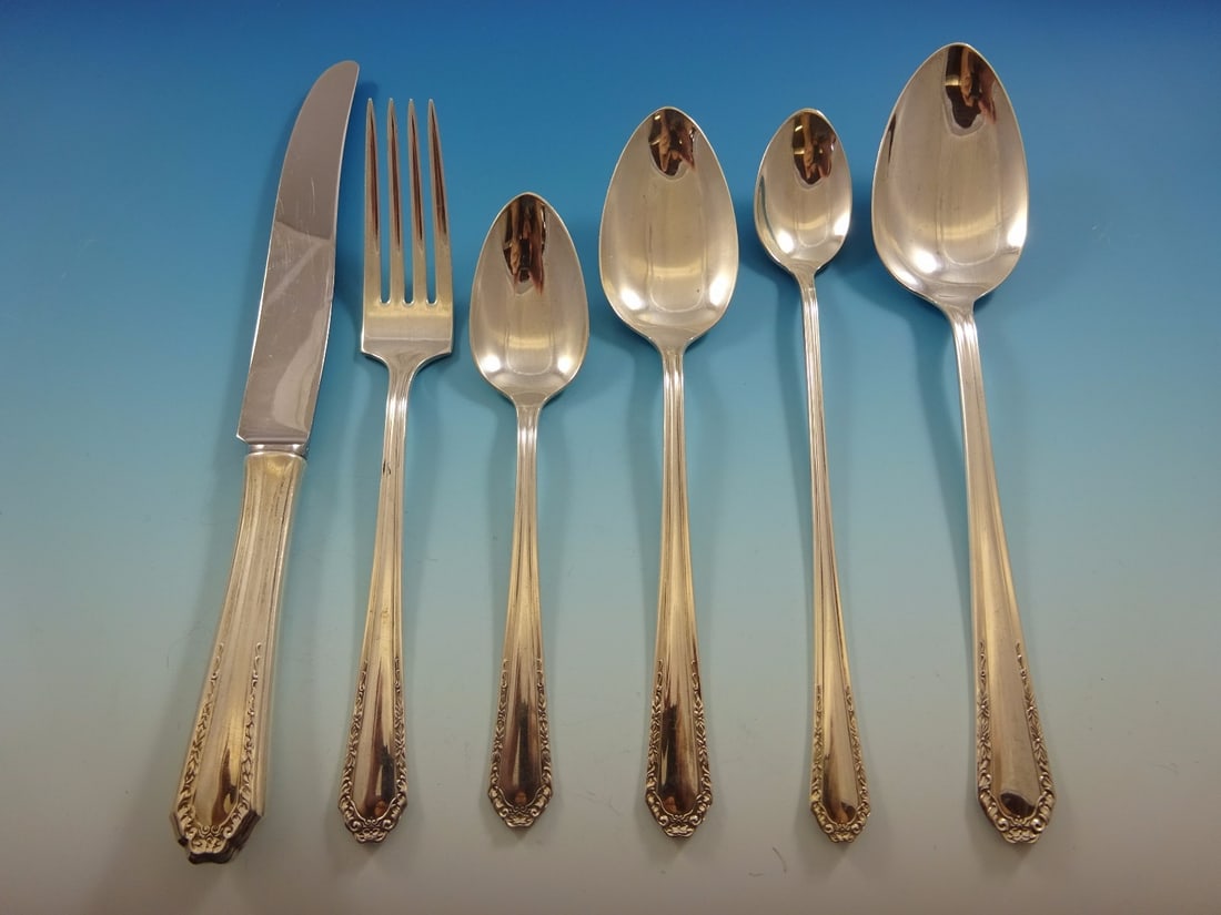 Marianne Sterling Silver Flatware Set for 6 by National 38 Pieces: Marianne Sterling Silver Flatware Set for 6 by National 38 Pieces Enhance your dining experience with the exquisite Marianne Sterling Silver Flatware Service for 6. This elegant set, crafted by Nation