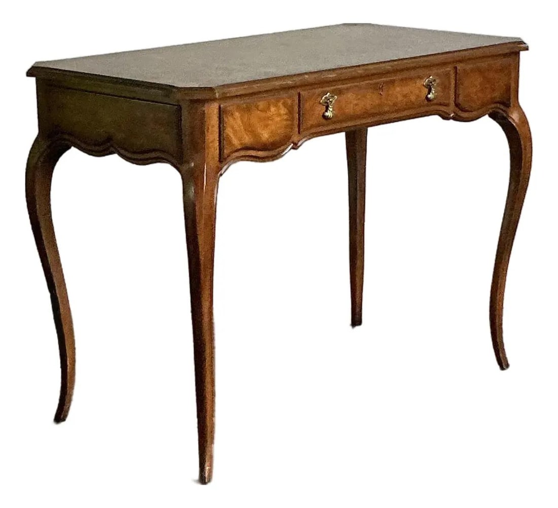 French Provincial Burlwood Desk with Cabriole Legs and Scalloped Apron: French Provincial Burlwood Desk with Cabriole Legs and Scalloped Apron This vintage writing desk by Drexel exemplifies French Provincial style with its elegantly curved cabriole legs, scalloped apron,