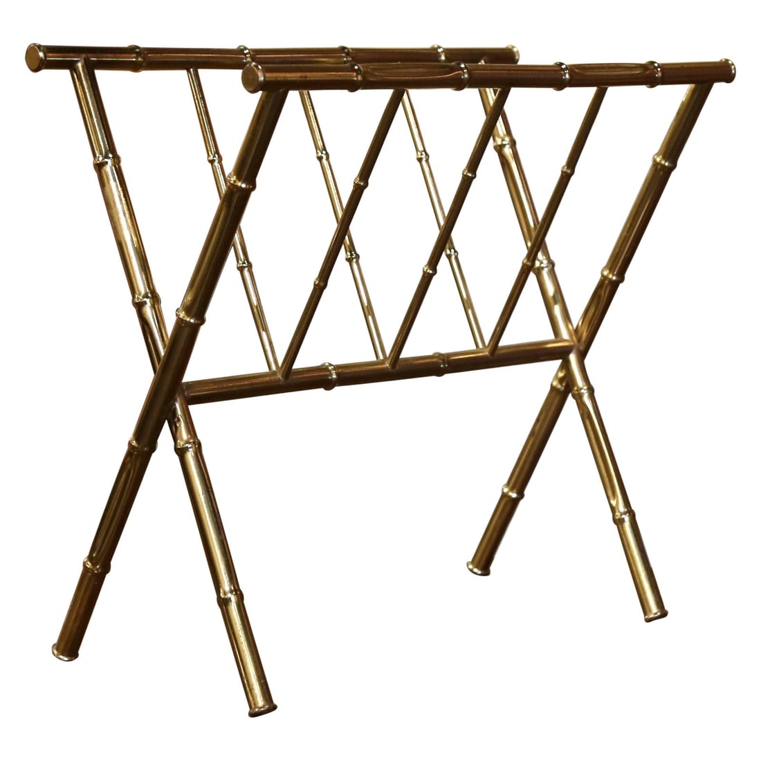 French Faux Bamboo Brass Magazine Holder Attributed to Maison Bagues Circa 1950: French Faux Bamboo Brass Magazine Holder Attributed to Maison Bagues Circa 1950 This mid-20th century French magazine rack features a faux bamboo design in brass with a patinated gilt finish. Hand-cra