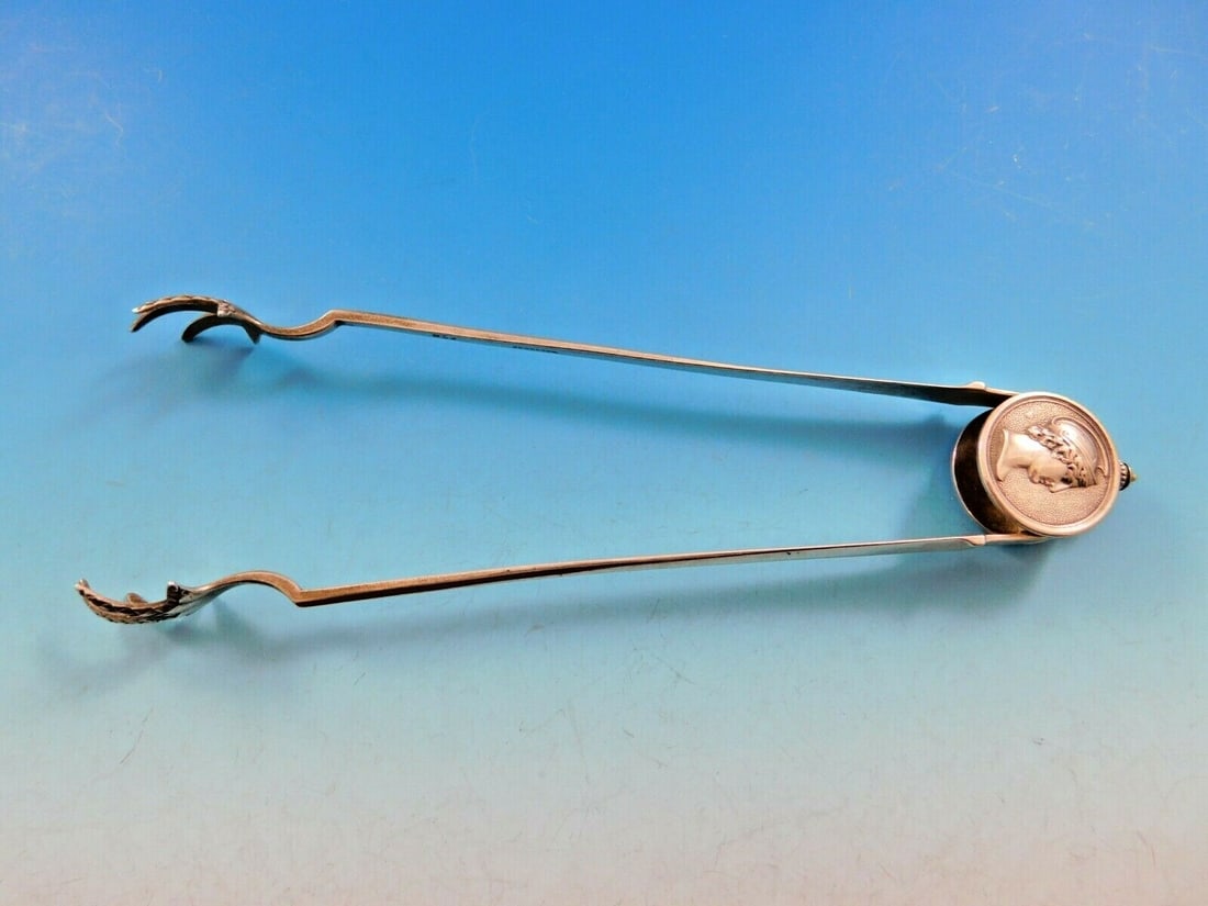 Gorham Sterling Silver Medallion Ice Tong 7 1/4 Inch Monogrammed: Gorham Sterling Silver Medallion Ice Tong 7 1/4 Inch Monogrammed This exquisite ice tong by Gorham is crafted from sterling silver and showcases the elegant Medallion pattern. Measuring 7 1/4 inches,