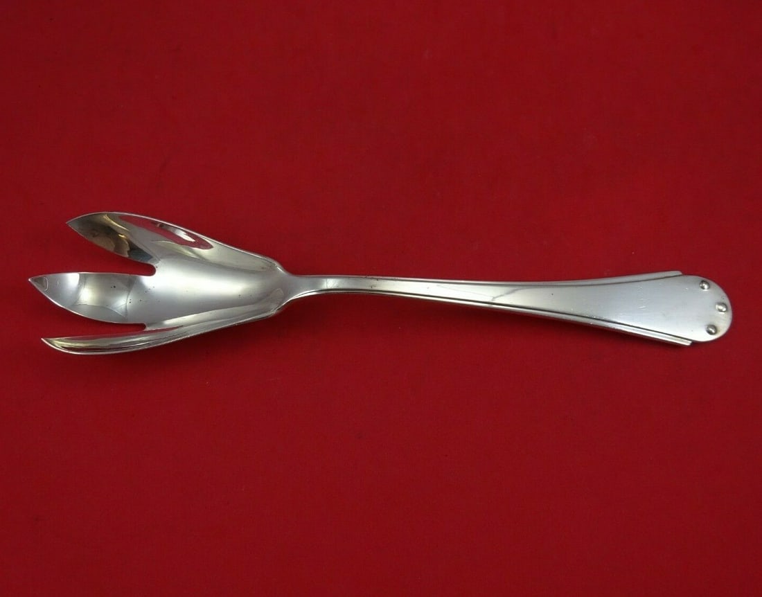 Bugatti Ettore Sterling Silver Salad Serving Fork 9 3/4 inches: Bugatti Ettore Sterling Silver Salad Serving Fork 9 3/4 inches This elegant Ettore by Bugatti salad serving fork is crafted from high-quality sterling silver and measures 9 3/4 inches in length. The f