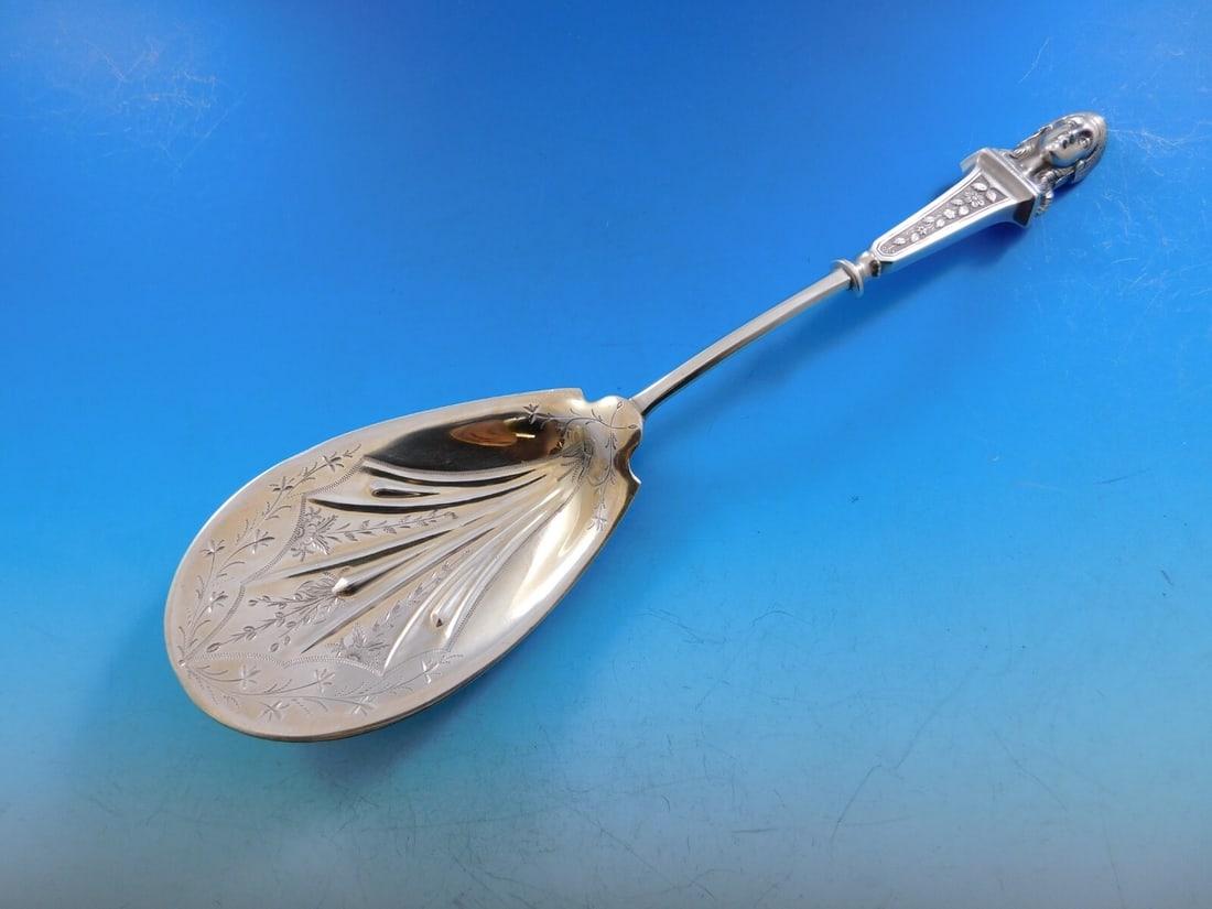 Albert Coles Bust Pattern Sterling Silver Berry Spoon 9.5 Inch: Albert Coles Bust Pattern Sterling Silver Berry Spoon 9.5 Inch This exquisite berry spoon, crafted by Albert Coles, features a stunning Brite-Cut design in the Bust pattern. Made from high-quality