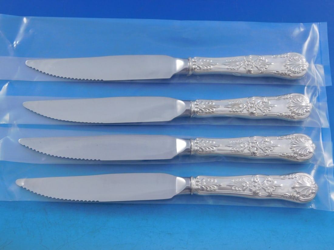 Tiffany & Co. English King Sterling Silver Steak Knife Set 4 pcs: Tiffany & Co. English King Sterling Silver Steak Knife Set 4 pcs This exquisite set of four steak knives features the renowned English King pattern by Tiffany & Co. Each knife showcases a sterling sil
