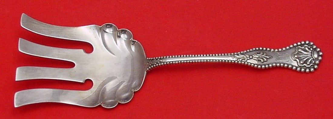 Dominick & Haff Charles II Sterling Silver Serving Fork 9.25": Dominick & Haff Charles II Sterling Silver Serving Fork 9.25" This exquisite serving fork, crafted by Dominick & Haff, features the elegant Charles II pattern and is made from high-quality sterling si