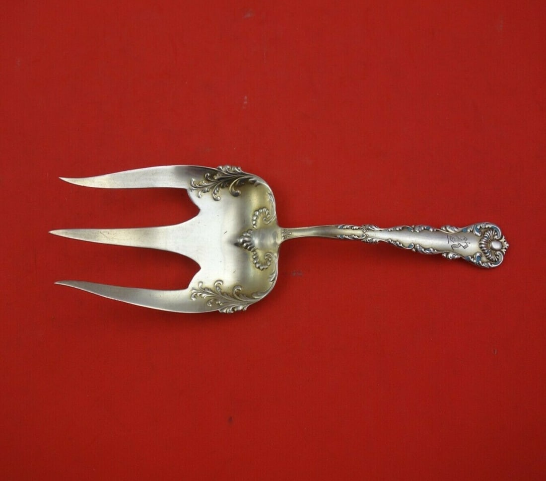 Frank Whiting Kings Court Sterling Silver Enameled Serving Fork 7 1/4": Frank Whiting Kings Court Sterling Silver Enameled Serving Fork 7 1/4" This exquisite serving fork from the Kings Court pattern by Frank Whiting is crafted from sterling silver, showcasing fine crafts