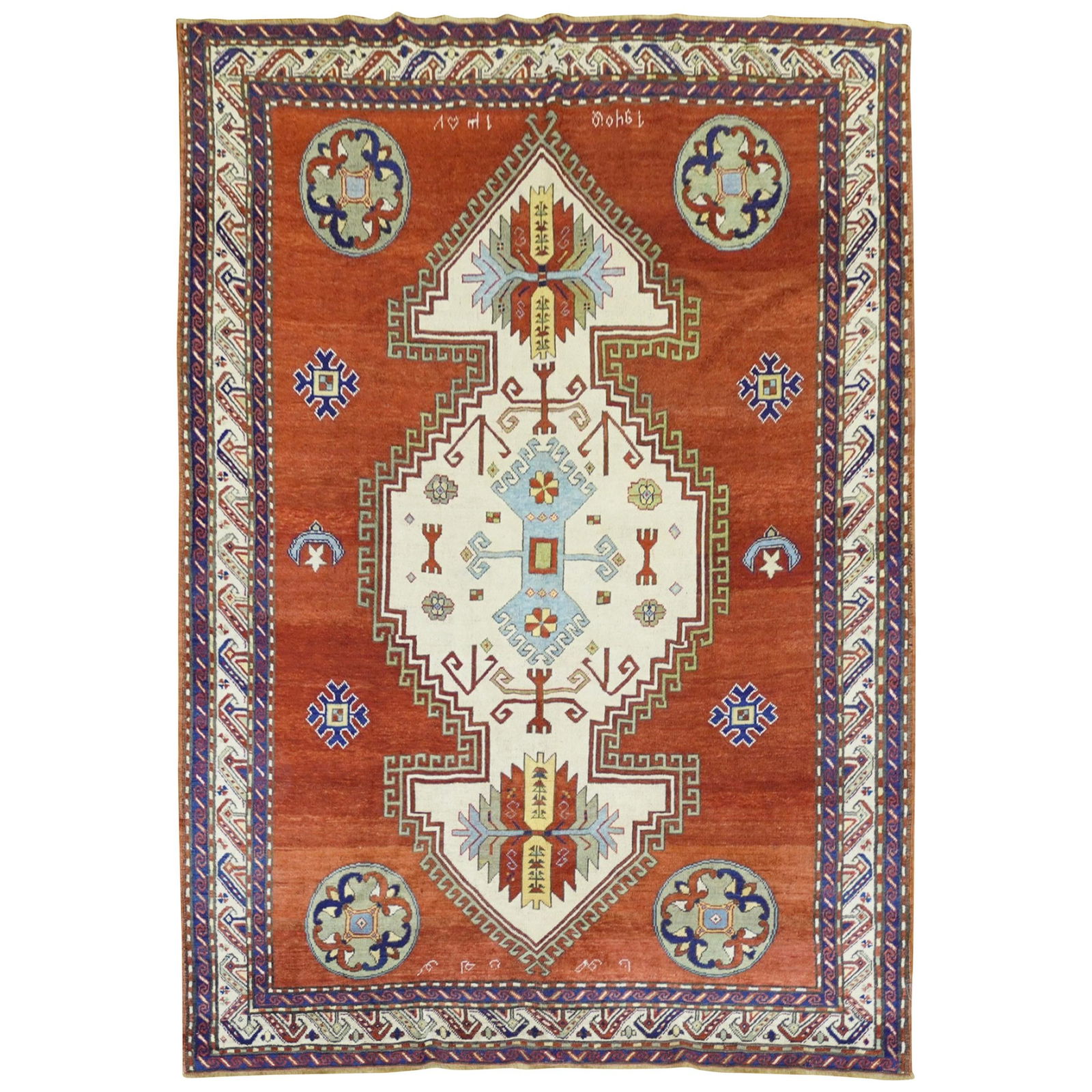 1940 Hand-Woven Armenian Kazak Rug Madder Red Tribal Design: 1940 Hand-Woven Armenian Kazak Rug Madder Red Tribal Design This stunning Madder Red Armenian Antique Rug, crafted in 1940, features a striking geometric tribal design characteristic of Kazak style. H