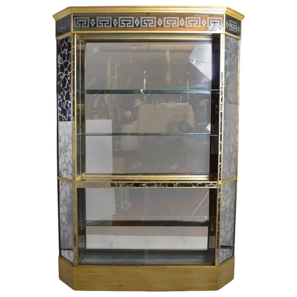 Elegant Eglomise Mirrored Back Bar in Gilded Wood Frame: Elegant Eglomise Mirrored Back Bar in Gilded Wood Frame This elegant eglomise mirrored back bar features a tall and narrow design, perfect for adding a touch of sophistication to your space. The open-