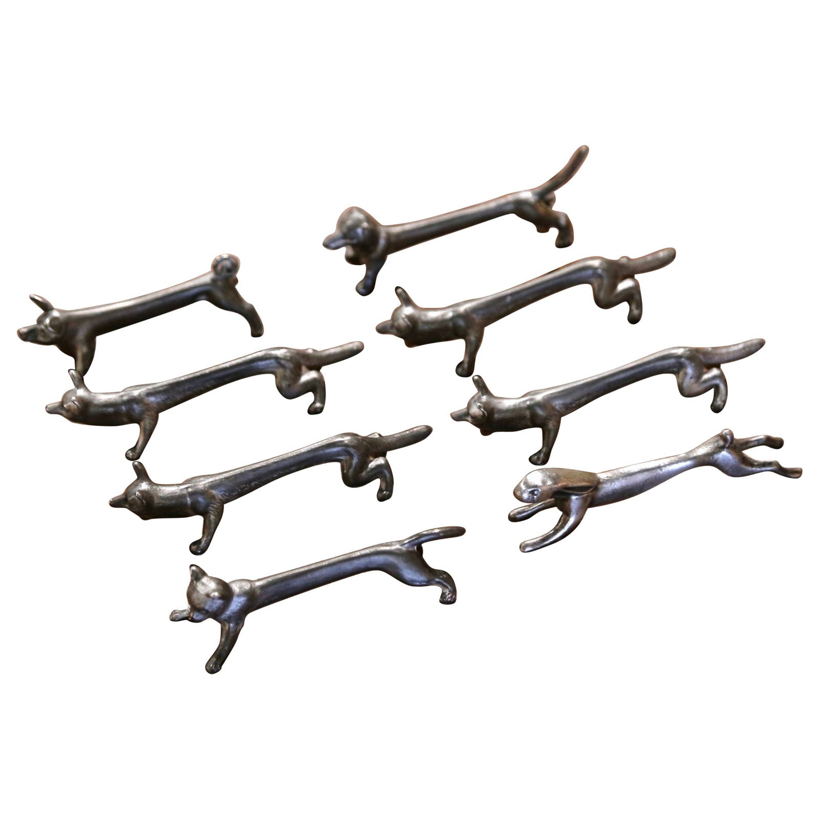 Set of 8 French Silvered Animal Knife Rests Mid-Century Table Decor: Set of 8 French Silvered Animal Knife Rests Mid-Century Table Decor Add a touch of sophistication to your dining experience with this set of eight mid-century French silvered metal animal knife rests.
