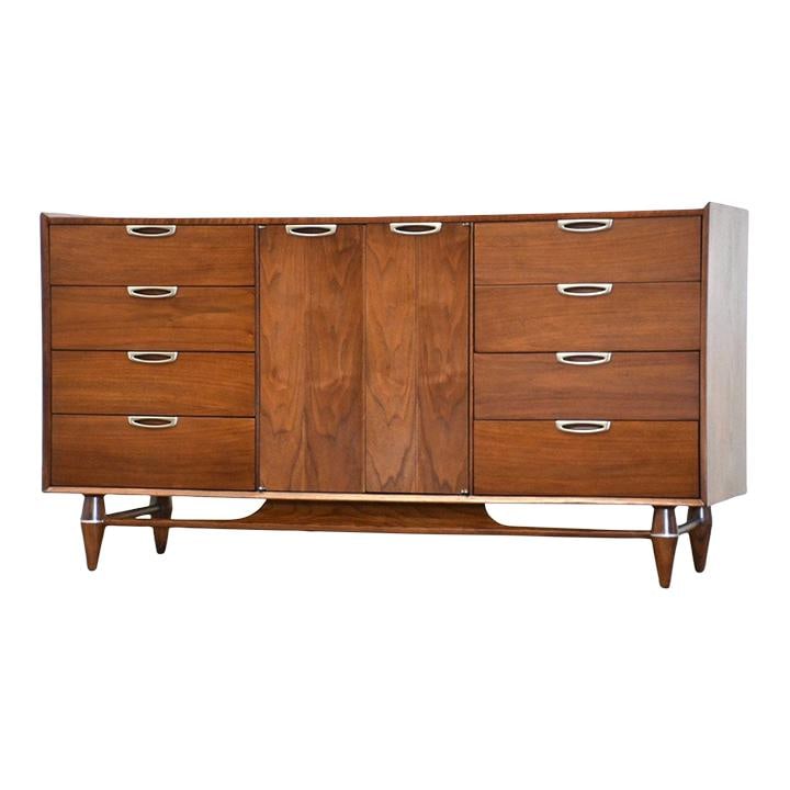 Refinished Walnut Mid Century Modern Dresser with Metal Accents: Refinished Walnut Mid Century Modern Dresser with Metal Accents This mid-century modern dresser is crafted from beautiful walnut and features two doors with stylish metal accents. Professionally refin