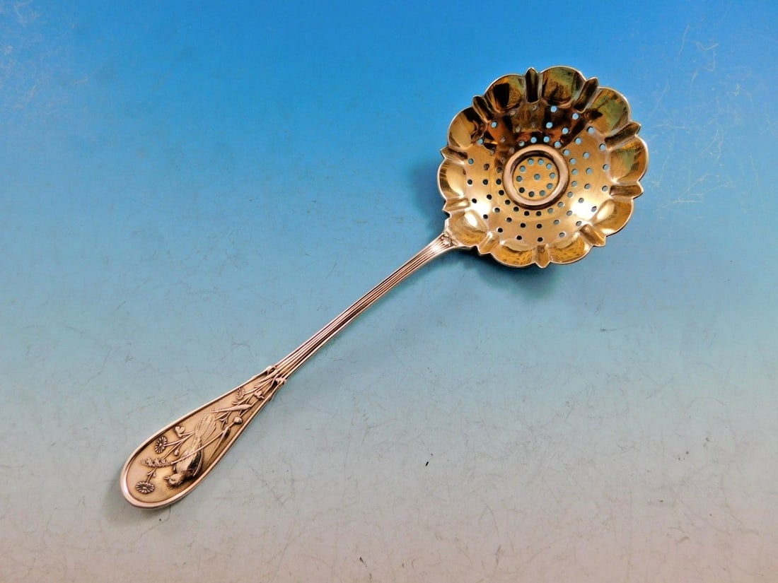 Tiffany & Co Japanese Sterling Silver Sugar Sifter Gold-Washed 5 7/8 Inch: Tiffany & Co Japanese Sterling Silver Sugar Sifter Gold-Washed 5 7/8 Inch Experience the elegance of Tiffany & Co. with this exquisite Japanese pattern sterling silver sugar sifter. Measuring 5 7/8