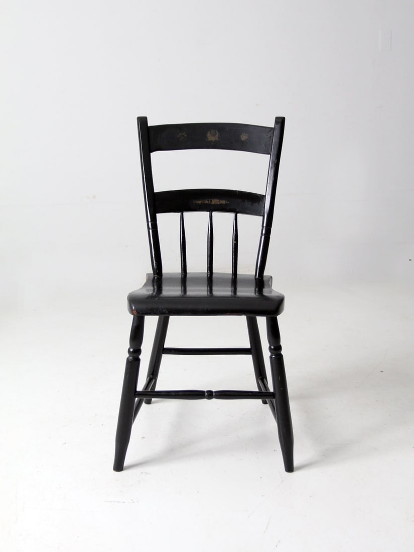 Antique Black Primitive Chair with Gold Stencil Design: Antique Black Primitive Chair with Gold Stencil Design This antique painted wood chair showcases a charming black primitive farmhouse design, featuring a plank seat and decorative gold stencil