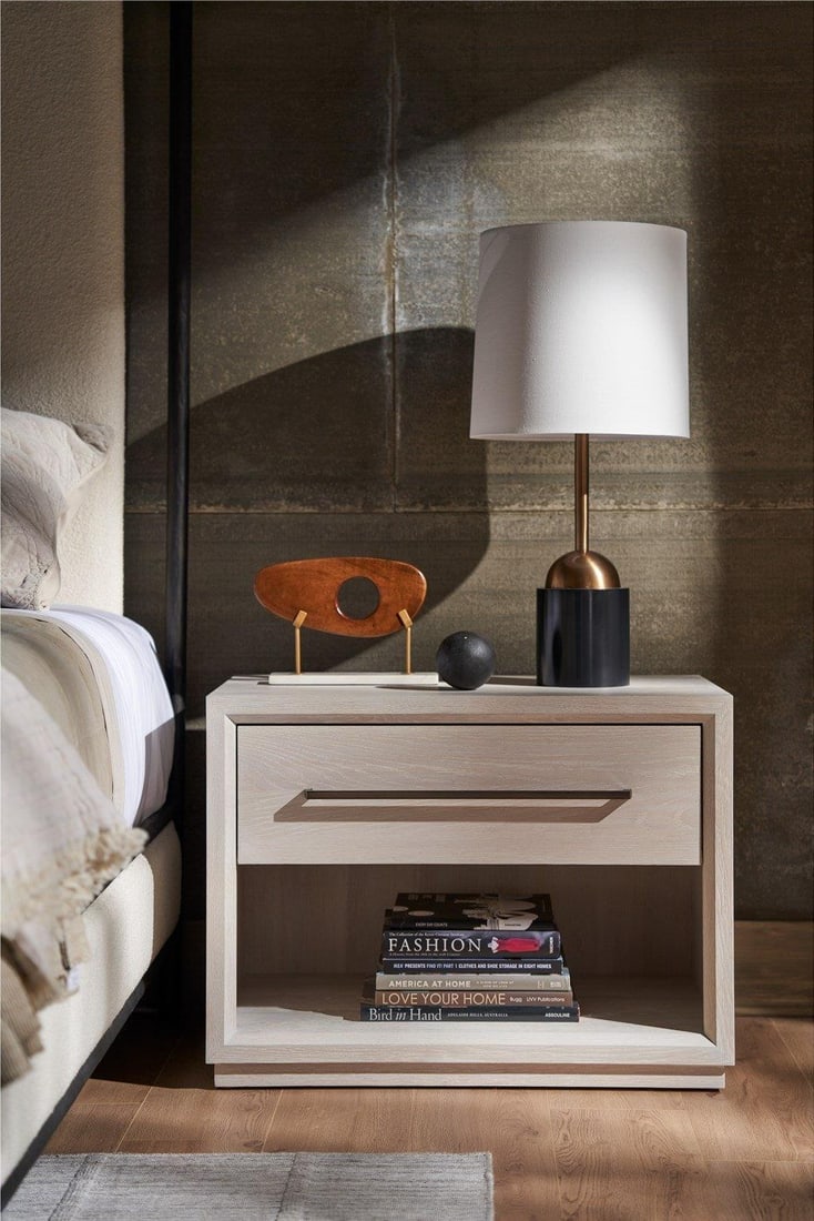 Universal Astrid White Oak Nightstand 24H 32W 19D: Universal Astrid White Oak Nightstand 24H 32W 19D Transform your bedroom with the Astrid Nightstand, a stylish addition that combines functionality with contemporary design. This drawer nightstand fea