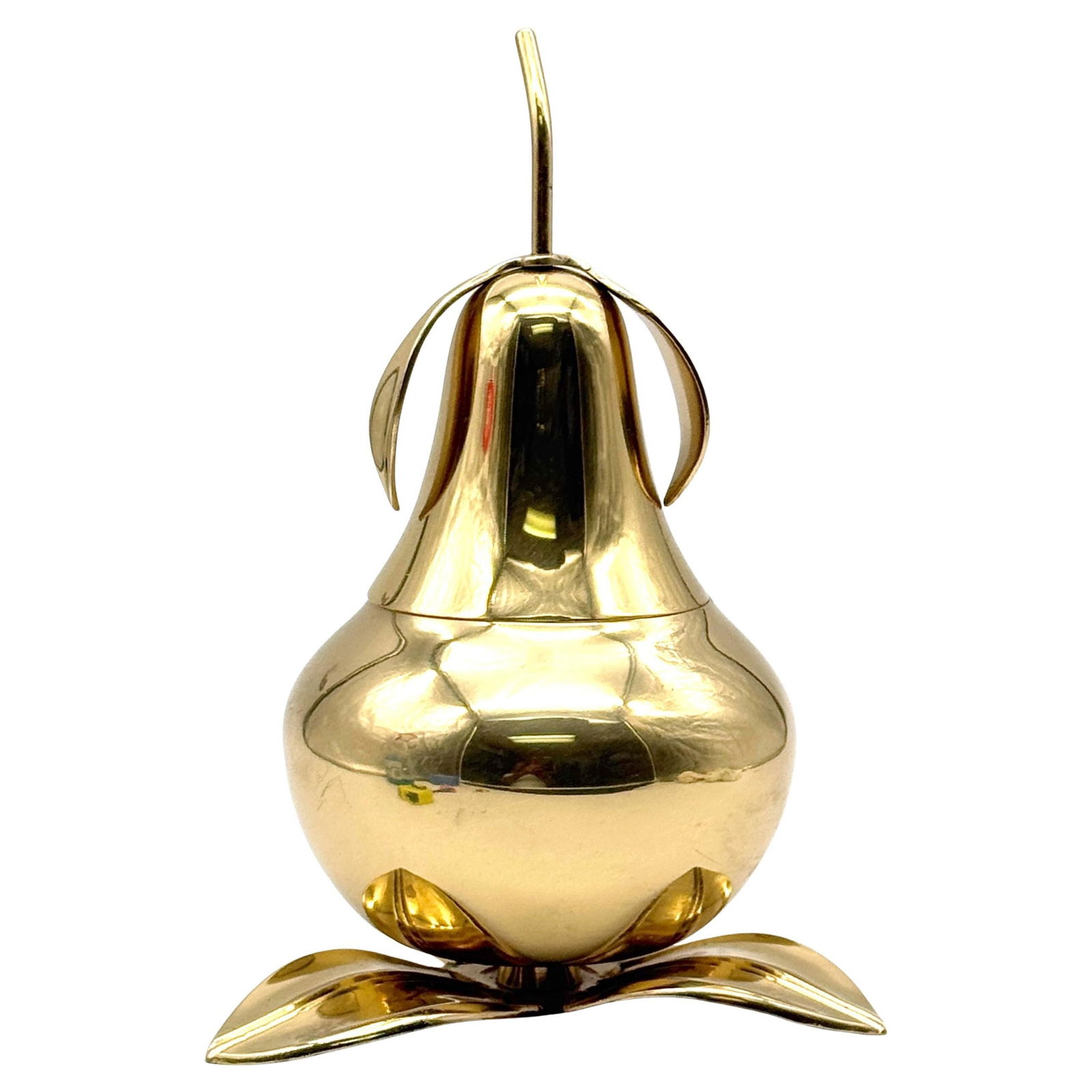 1970s Italian Brass Pear Lidded Box on Leaf Base Mid-Century Modern: 1970s Italian Brass Pear Lidded Box on Leaf Base Mid-Century Modern This striking 1970s Italian lidded table box takes the form of a stylized pear, expertly crafted from polished brass and resting on