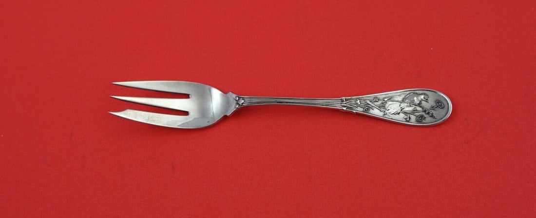 Tiffany & Co Sterling Silver 3-Tine Japanese Oyster Fork 5": Tiffany & Co Sterling Silver 3-Tine Japanese Oyster Fork 5" This exquisite oyster fork from Tiffany & Co. is a stunning example of the Japanese pattern, showcasing a beautiful 3-tine design.