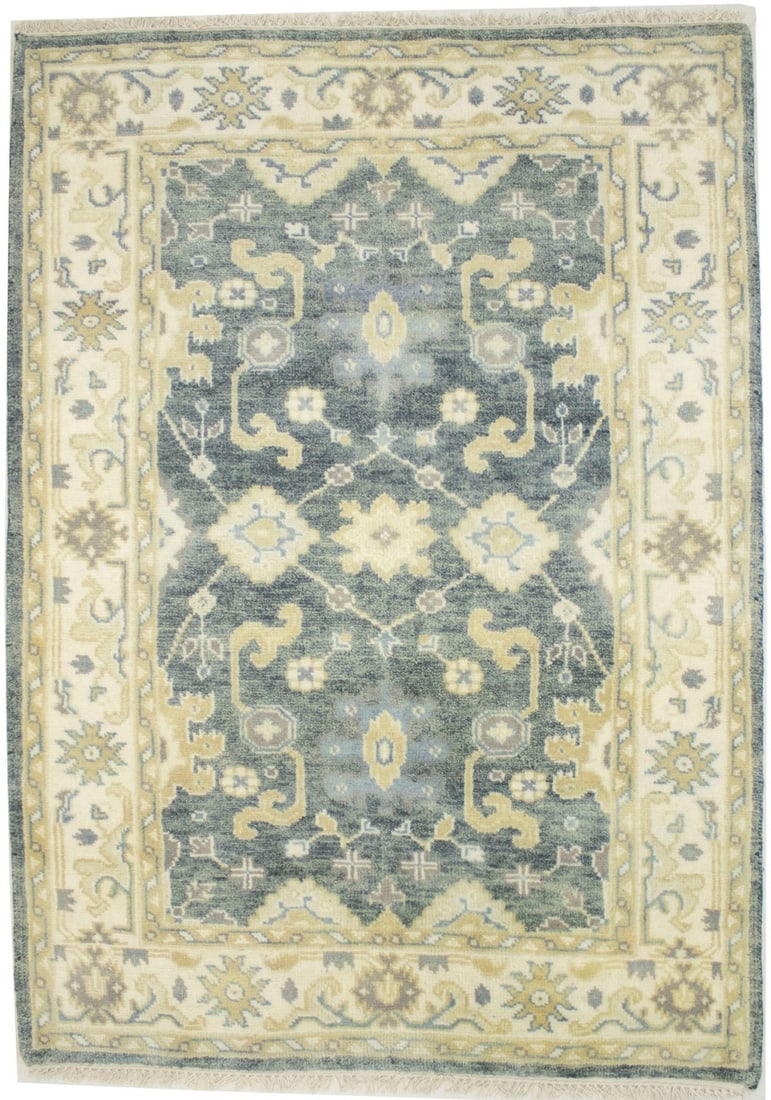 Hand-Knotted Wool Area Rug with Floral Pattern in Muted Tones 4'2 x 5'9: Hand-Knotted Wool Area Rug with Floral Pattern in Muted Tones 4'2 x 5'9 This handmade oriental area rug features a classic floral design in muted colors, including stone gray, cream, brown, and beige.