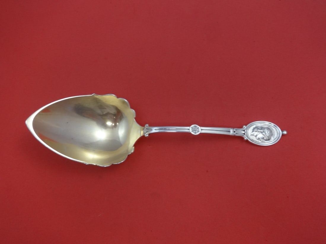 Wendt Medallion Sterling Silver Gold Washed Serving Spoon 8.75": Wendt Medallion Sterling Silver Gold Washed Serving Spoon 8.75" This exquisite vegetable serving spoon is part of the Medallion pattern by Wendt. Crafted from high-quality sterling silver, it