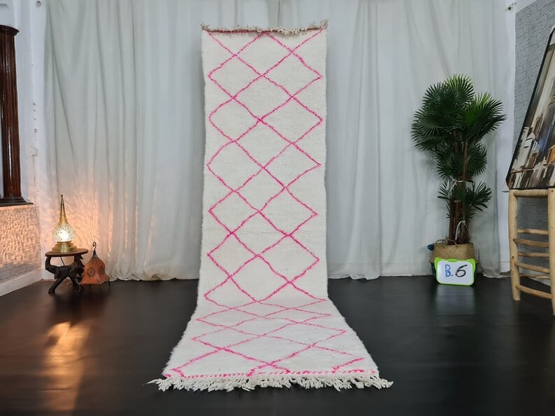 Handwoven White Runner Rug with Pink Geometric Pattern 2x10ft: Handwoven White Runner Rug with Pink Geometric Pattern 2x10ft Enhance your space with this Fabulous White Soft Runner Rug, featuring a charming pink geometric pattern. This luxurious runner was