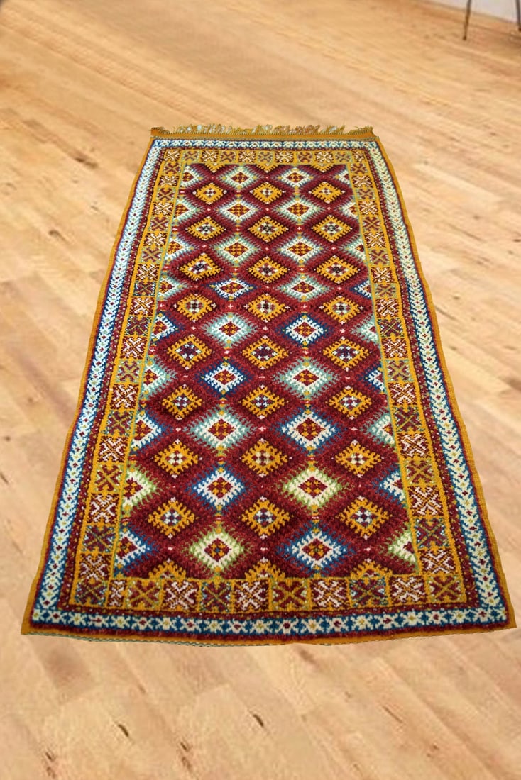 Colorful Handmade Moroccan Taznakht Wool Rug 217 x 100cm: Colorful Handmade Moroccan Taznakht Wool Rug 217 x 100cm Experience the artistry of Morocco with this stunning handmade Taznakht rug. Featuring a vibrant geometric design, this rug is crafted by