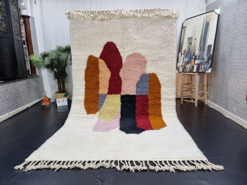 Authentic 100% Sheep Wool Moroccan Berber Rug 10 x 5 Feet: Authentic 100% Sheep Wool Moroccan Berber Rug 10 x 5 Feet Enhance your home decor with this stunning authentic soft handmade Moroccan Berber wool rug. Crafted by skilled local Berber women weavers in