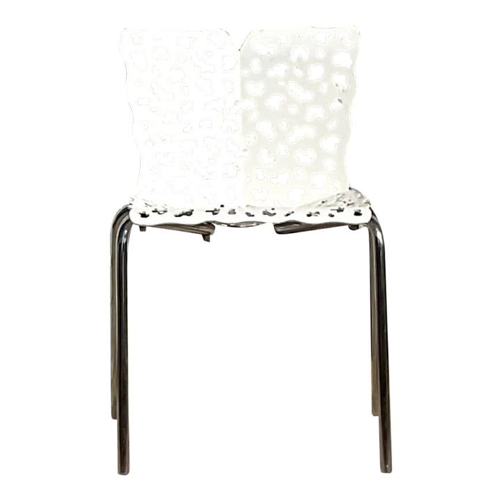 Vintage Cutout Chair Inspired by Richard Schultz White Wood Metal: Vintage Cutout Chair Inspired by Richard Schultz White Wood Metal Elevate your contemporary space with this vintage cutout topiary chair, inspired by Richard Schultz. This chair showcases a sleek desi