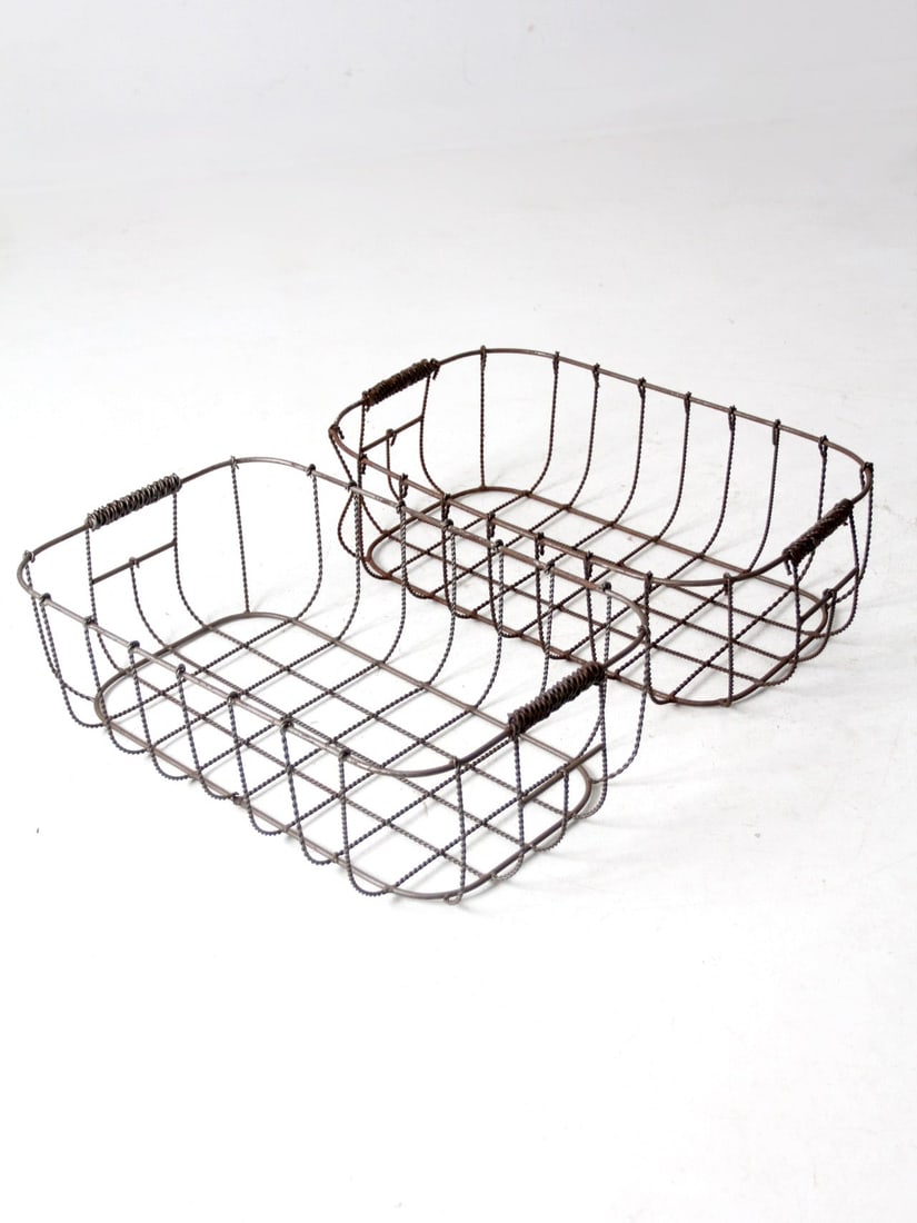 Charming Vintage Wire Baskets Pair with Wrapped Handles: Charming Vintage Wire Baskets Pair with Wrapped Handles This charming pair of vintage wire metal baskets is perfect for organizing and adding character to any space. Featuring wrapped wire handles and