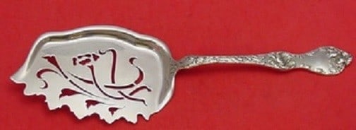 Reed and Barton Les Cinq Fleurs Sterling Silver Pierced Macaroni Server 10 1/4": Reed and Barton Les Cinq Fleurs Sterling Silver Pierced Macaroni Server 10 1/4" Presenting the exquisite Les Cinq Fleurs macaroni server by Reed & Barton, crafted from sterling silver. This stunning p