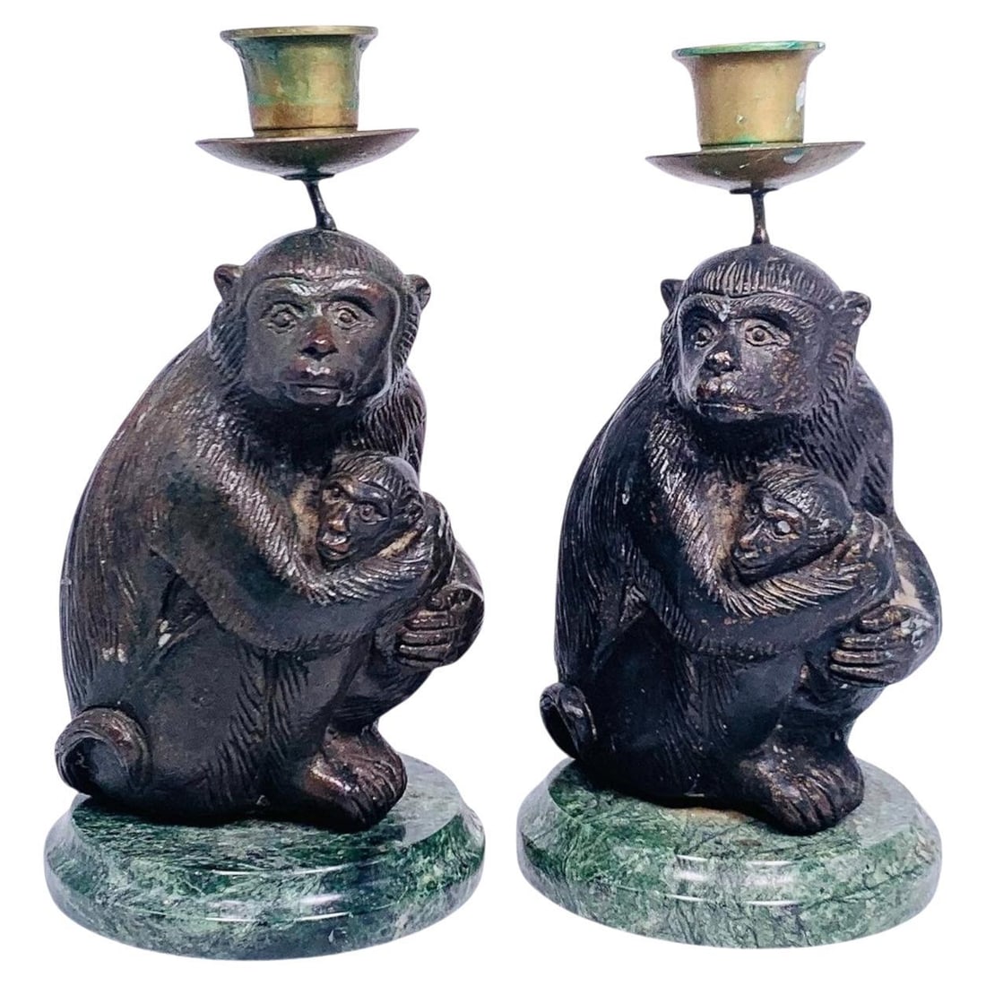 Set of Two Patinated Bronze Monkey Candle Holders circa 1970s: Set of Two Patinated Bronze Monkey Candle Holders circa 1970s This set includes two mid-century patinated bronze candlesticks, each featuring a seated monkey design. Crafted in the 1970s, these candle