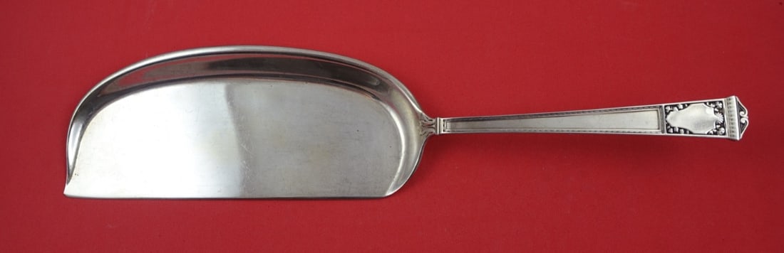 Tiffany & Co San Lorenzo Sterling Silver Crumber 13.25": Tiffany & Co San Lorenzo Sterling Silver Crumber 13.25" This exquisite crumber from the renowned San Lorenzo pattern by Tiffany & Co. showcases the elegance and craftsmanship of sterling silverware. M