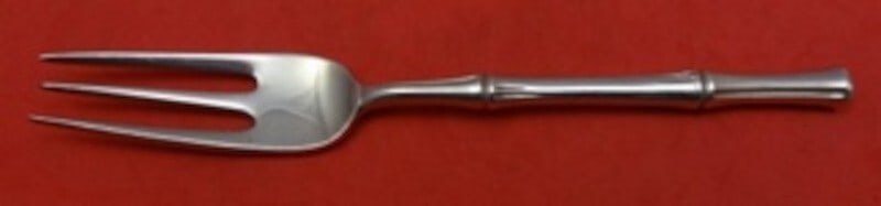 Tiffany & Co Bamboo Sterling Silver 3-Tine Dinner Fork 7 3/8in: Tiffany & Co Bamboo Sterling Silver 3-Tine Dinner Fork 7 3/8in Elevate your dining experience with this exquisite Bamboo dinner fork by Tiffany & Co. Crafted from high-quality sterling silver, this 3-