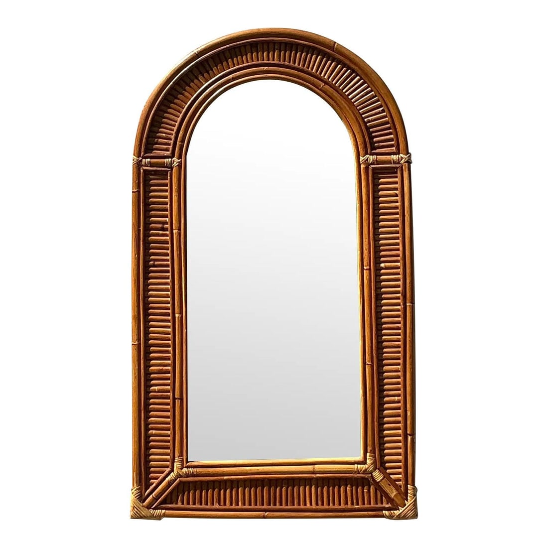 Vintage Coastal Arched Rattan Mirror with Bamboo Frame: Vintage Coastal Arched Rattan Mirror with Bamboo Frame Enhance your space with this Vintage Coastal Arched Rattan Mirror, a perfect blend of warm natural texture and timeless elegance. Featuring a gra