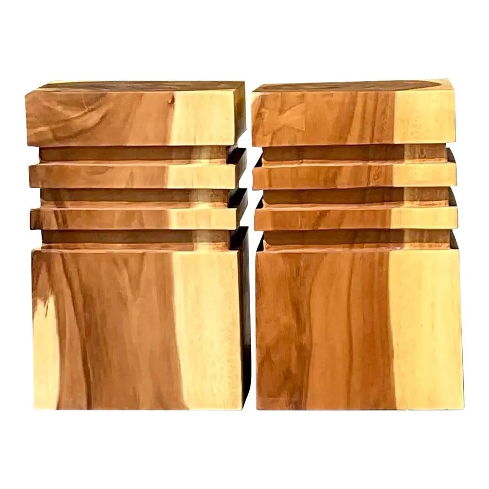 Pair of Vintage Boho Chocolate Wood Low Stools: Pair of Vintage Boho Chocolate Wood Low Stools This stunning pair of vintage Boho low stools features exquisite hand-carved wood stumps, showcasing a unique banded routed detail along the top. The ric