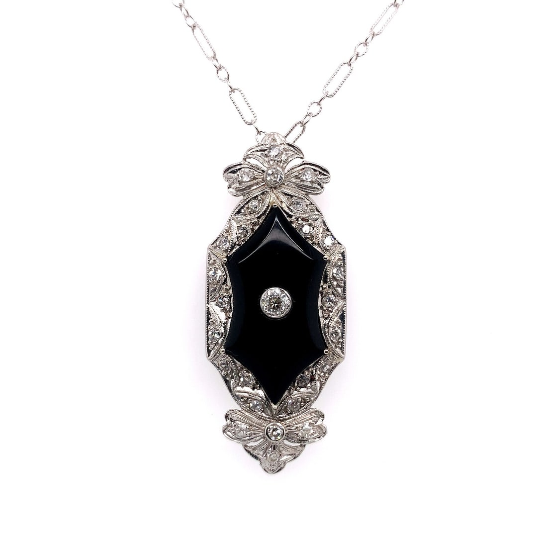 Antique Platinum Black Onyx Diamond Pendant with 14k White Gold Chain: Antique Platinum Black Onyx Diamond Pendant with 14k White Gold Chain This exquisite pendant features a stunning combination of genuine natural black onyx and sparkling diamonds, crafted in luxurious