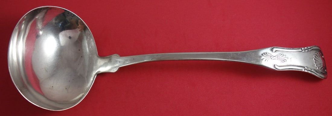 D and K Coin Silver 12.5 Inch Soup Ladle Serving Utensil: D and K Coin Silver 12.5 Inch Soup Ladle Serving Utensil This exquisite coin silver soup ladle measures 12 1/2 inches and is perfect for serving soups and stews. With an elegant design and excellent c