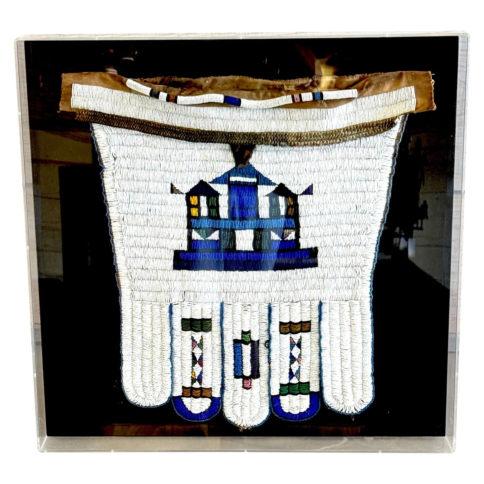 Lakota Sioux Beaded Saddlebag Panel Mid-20th Century in Shadow Box Frame: Lakota Sioux Beaded Saddlebag Panel Mid-20th Century in Shadow Box Frame This framed mid-20th century Lakota (Sioux) beaded saddle bag panel is attributed to the Lakota people of the Plains region and