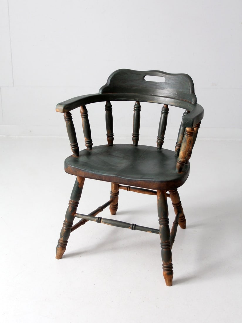 Early 20th Century Antique Oak Captains Chair in Dark Emerald Green: Early 20th Century Antique Oak Captains Chair in Dark Emerald Green Discover this classic early 20th century antique painted captain's chair, featuring a striking dark emerald green paint wash. Crafte