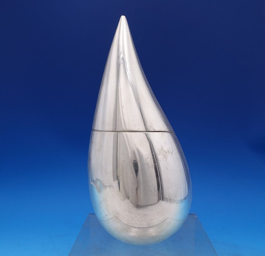 Christofle Sterling Silver Teardrop Storage Caddy 432/1000: Christofle Sterling Silver Teardrop Storage Caddy 432/1000 This exquisite Christofle storage caddy is crafted from high-quality sterling silver (.925) and showcases a stunning teardrop design. Measuri