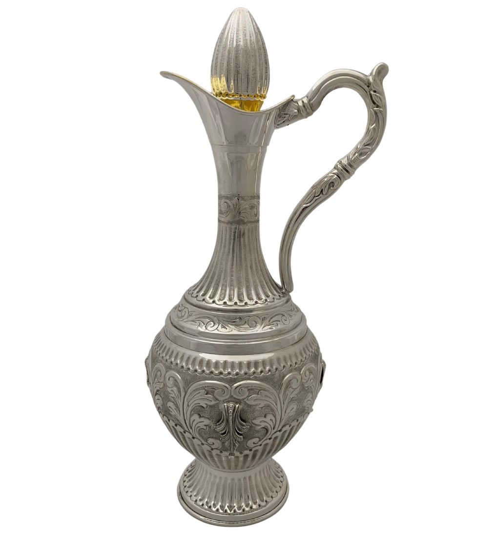 Handmade 925 Sterling Silver Fluted Wine Bottle with Leaf Applique: Handmade 925 Sterling Silver Fluted Wine Bottle with Leaf Applique This exquisite wine bottle is crafted from fine 925 sterling silver, showcasing a stunning handmade chased leaf applique design compl