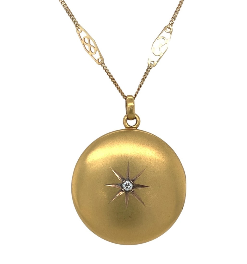 Victorian Era 10k Gold Round Diamond Locket With 14k Gold 24 Inch Chain: Victorian Era 10k Gold Round Diamond Locket With 14k Gold 24 Inch Chain This Victorian-era necklace features a round 10k yellow gold photo locket adorned with a genuine natural diamond accent set in a